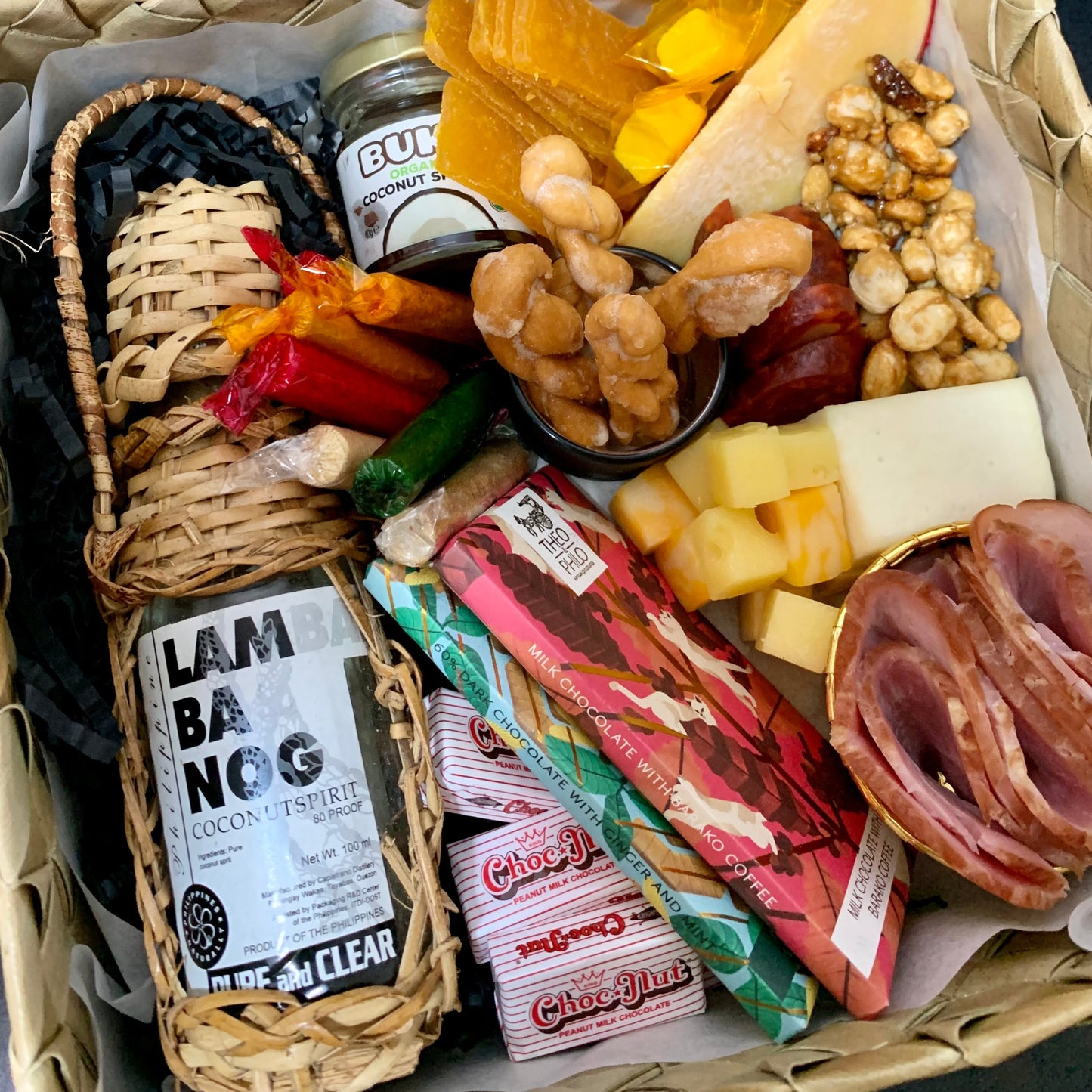 Grazing box with cheeses, cold cuts, fruits, nuts, and other treats